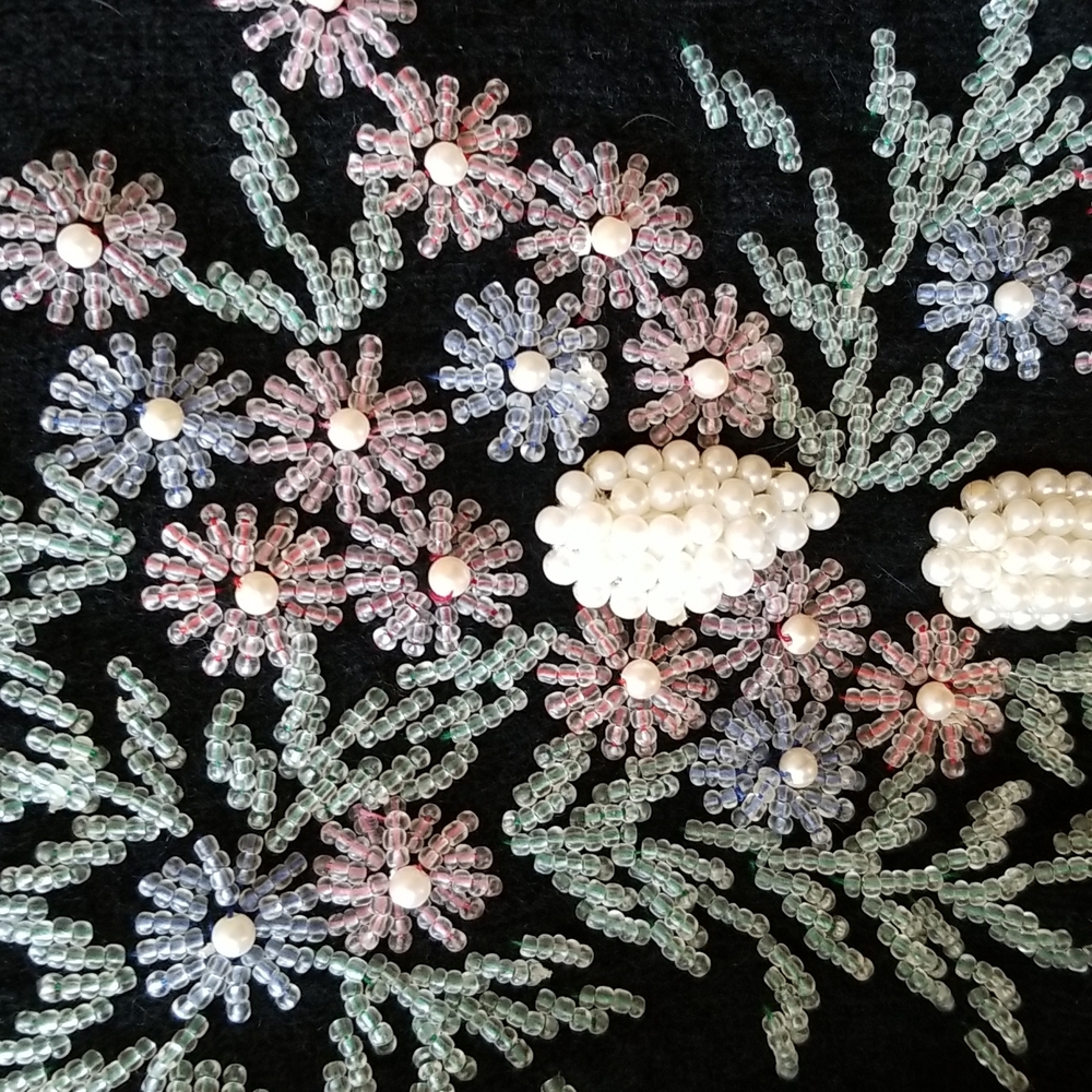 Vintage beaded cardigan: size M(current era) Black with intact floral beading.